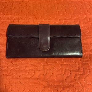 HOBO International wallet.  Used but in good condition.  L 7 by 3 1/2 in.